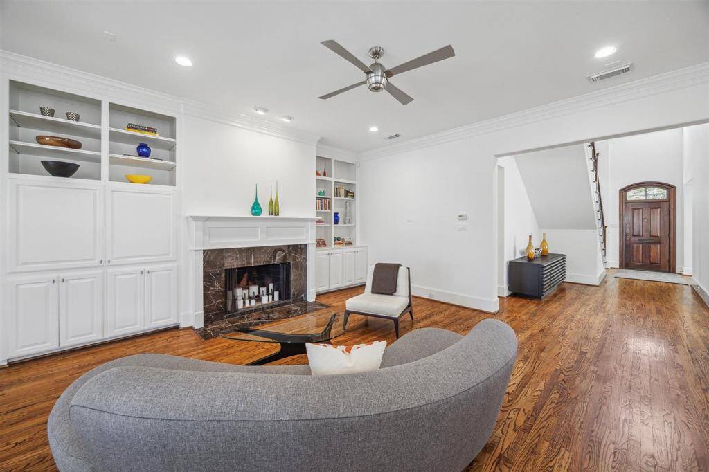 The family room features a fireplace and built-ins