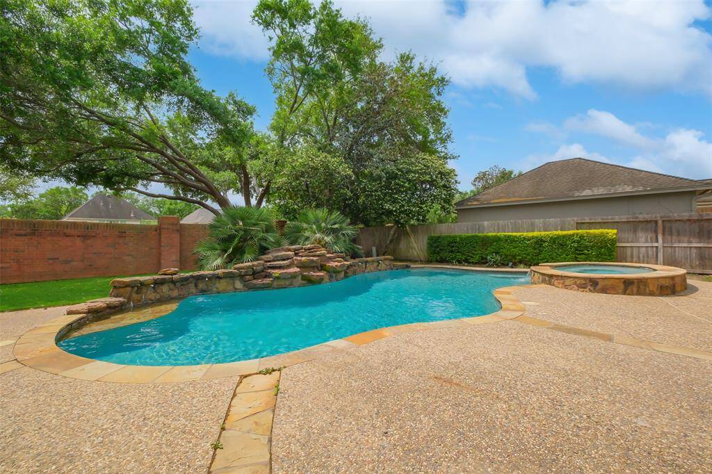 ENJOY STAYCATION LIVING EVERY DAY IN YOUR PRIVATE POOL AND SPA RETREAT—PERFECT FOR SUMMER FUN AND PEACEFUL EVENINGS.