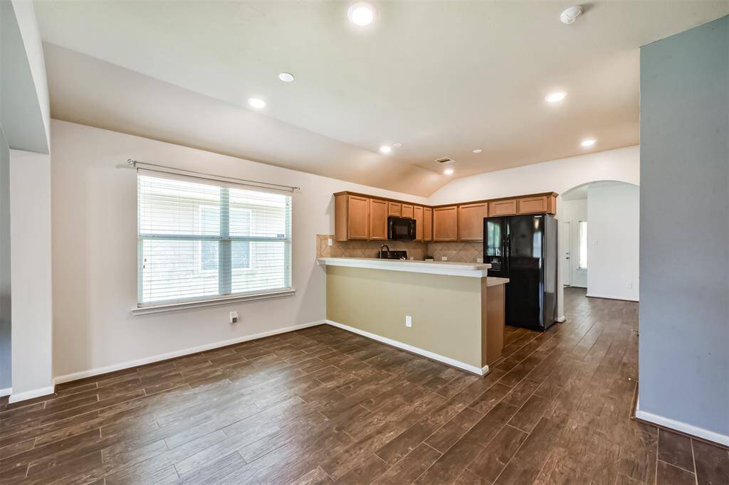 A dining area spacious enough to accommodate a table comfortably, offering both practicality and style.