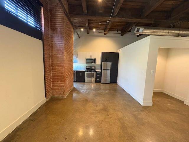 Exposed Brick, tall ceilings & more ....... a True Warehouse Loft