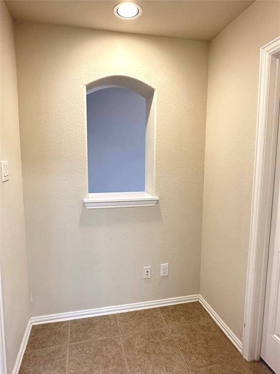 Computer area next to kitchen.
