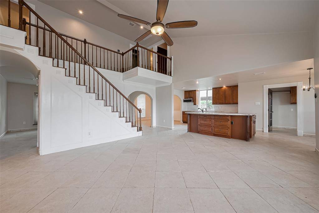 View from the fireplace back into the wide open floorplan.