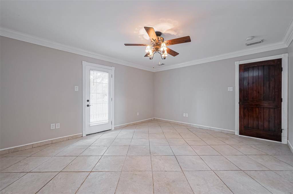 First floor primary, with door to front porch.
