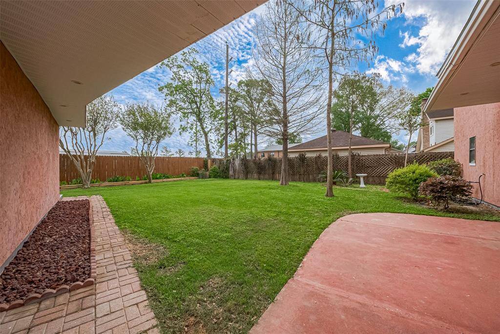 This extended stained concrete patio is ready for BBQ's