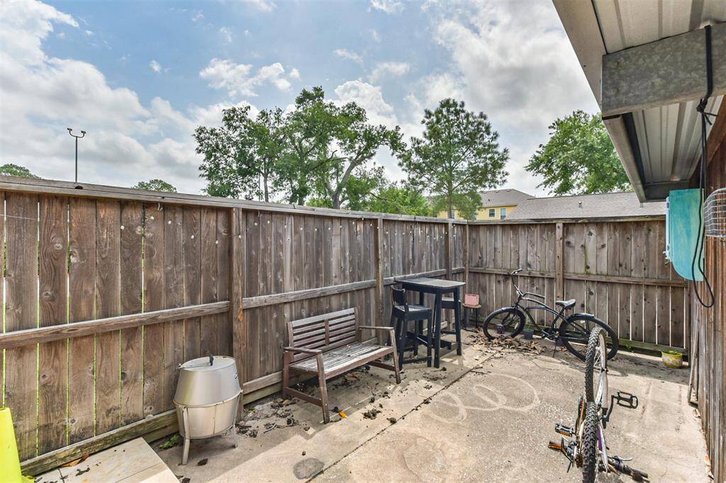 The patio has enough room for furniture and your favorite grill.
