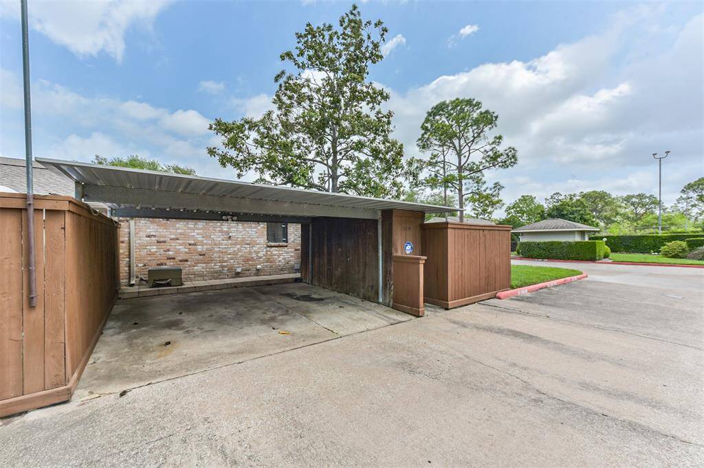 There is a two car attached carport.