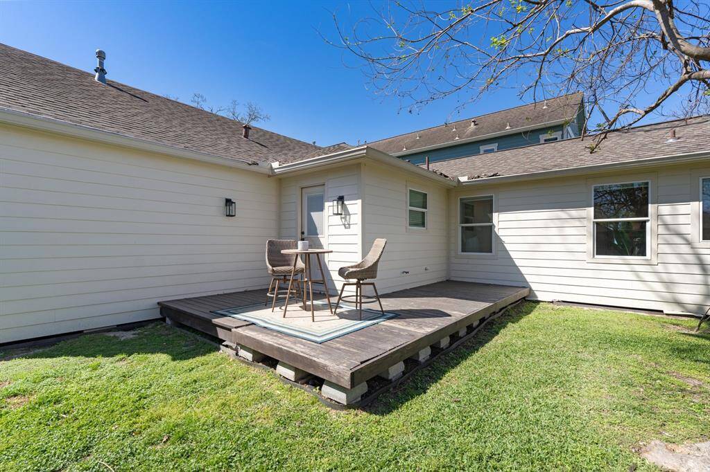 Outside, the backyard provides a private oasis with a patio area perfect for gatherings or simply unwinding after a busy day.