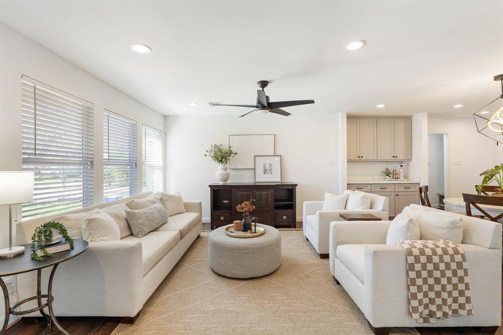 Step inside to find a spacious living area with plenty of natural light, creating a warm and inviting atmosphere for relaxing or entertaining.