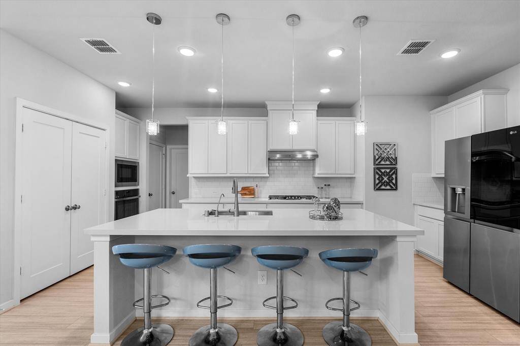 Kitchen with oversize island.