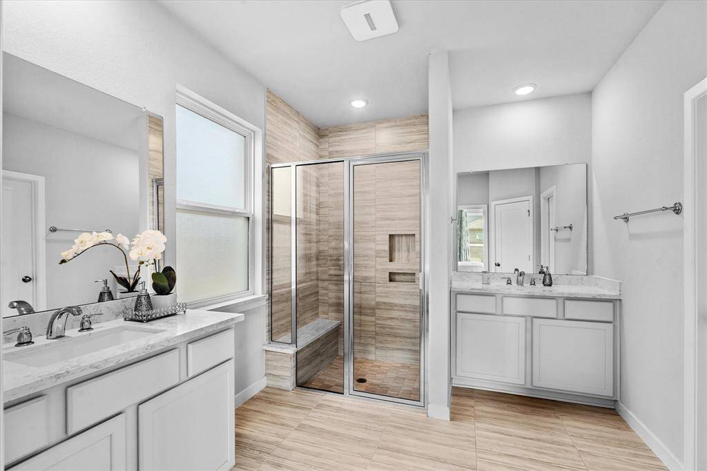 Primary bathroom with standup shower.