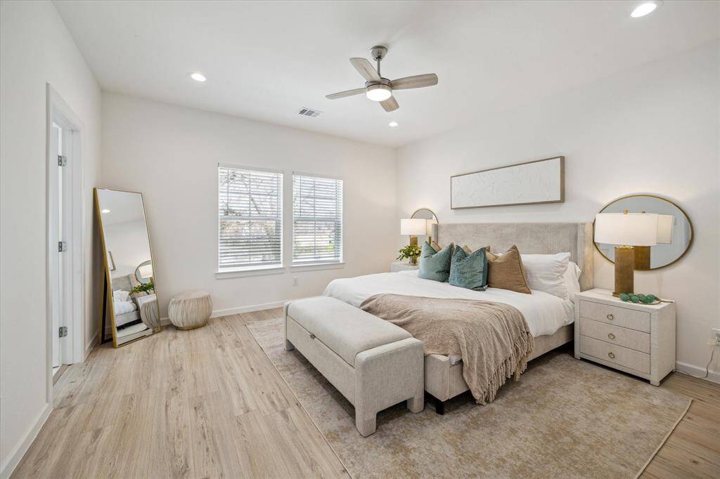 Spacious primary suite with abundant natural light