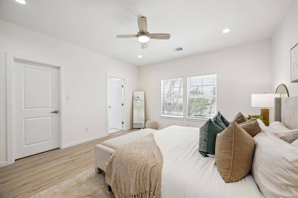 Spacious primary suite with abundant natural light