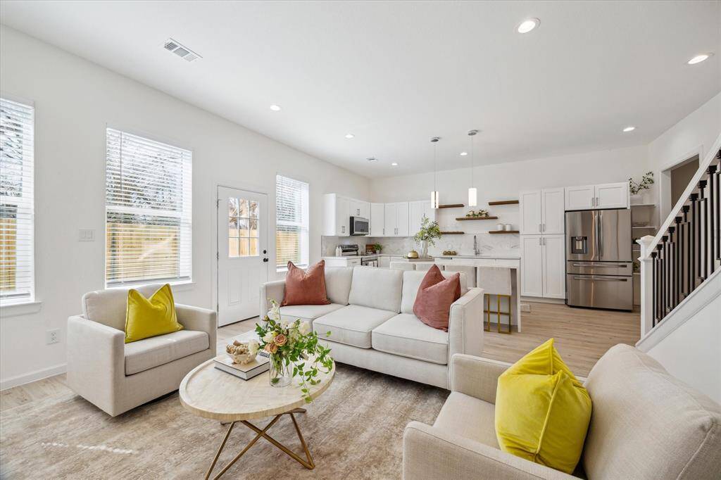 First floor living/kitchen/dining in this beautiful new construction home!*Representative Photo