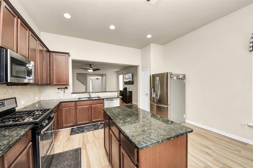 Fridge in this picture will be removed to allow more room for dining/breakfast table