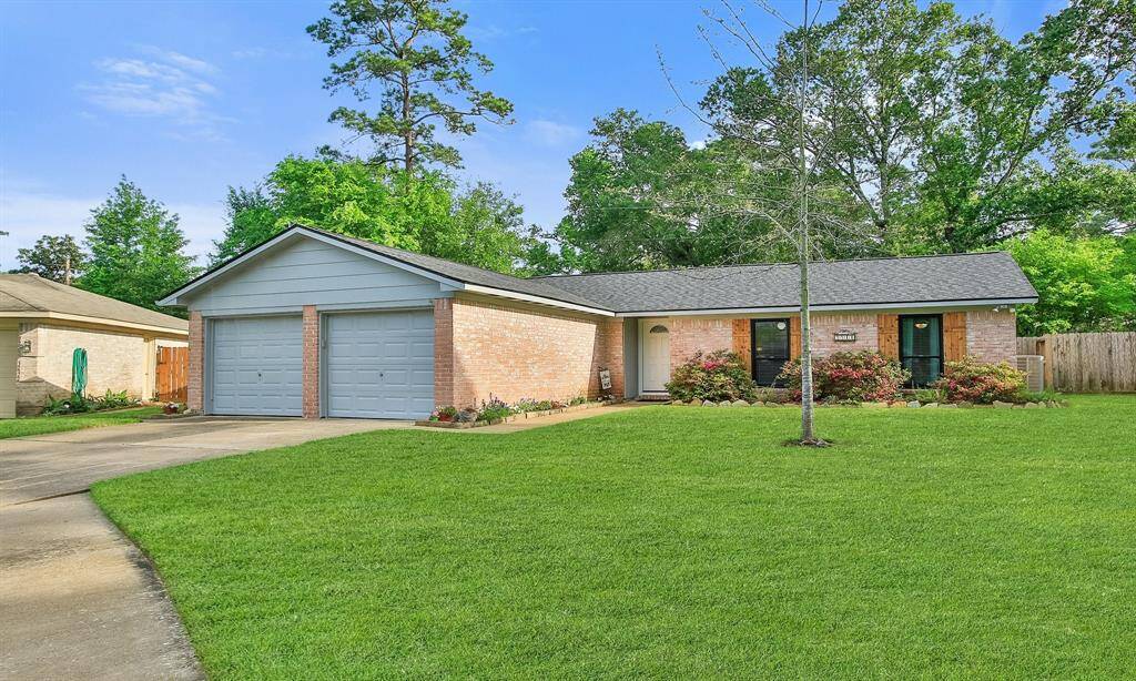 Charming single-story brick home with a well-maintained lawn and mature trees. Features a two-car garage and inviting landscaping. Ideal for those seeking a cozy, suburban feel.
