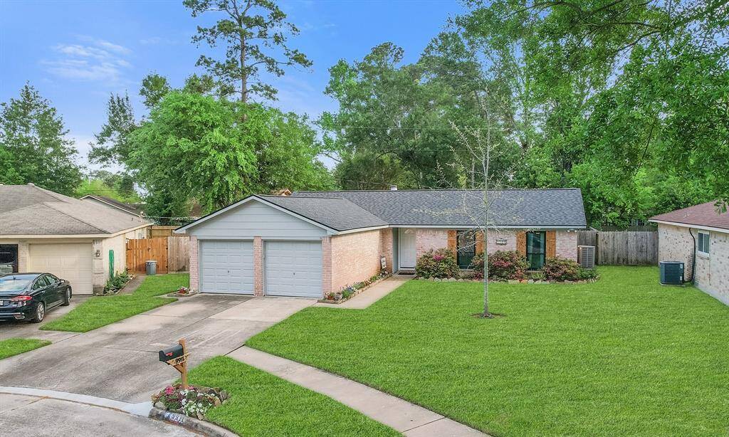 Charming single-story home featuring a two-car garage, well-maintained lawn, and mature trees. The property offers a cozy, welcoming atmosphere with brick exterior and a neat front garden. Ideal for those seeking a peaceful neighborhood setting.