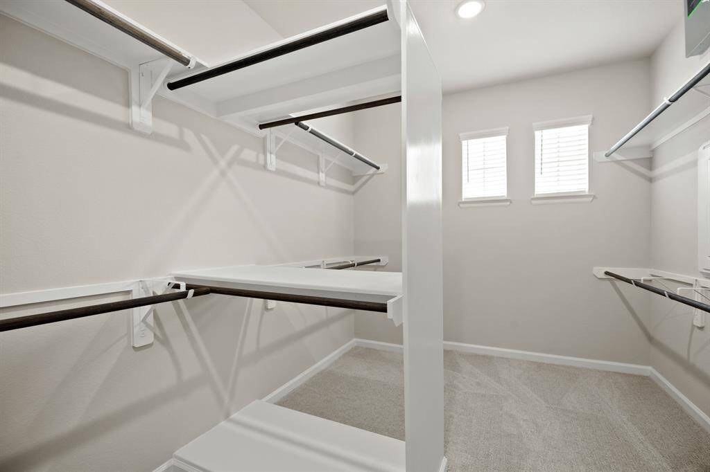 Huge walk-in closet in primary suite (*Photo not of actual home and used for illustration purposes only.)