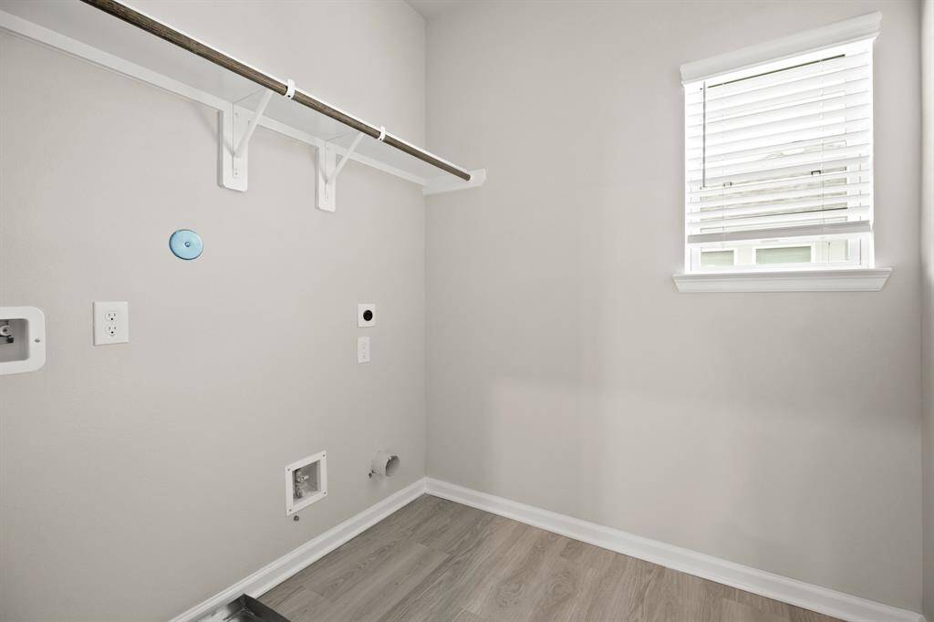 Laundry room (*Photo not of actual home and used for illustration purposes only.)