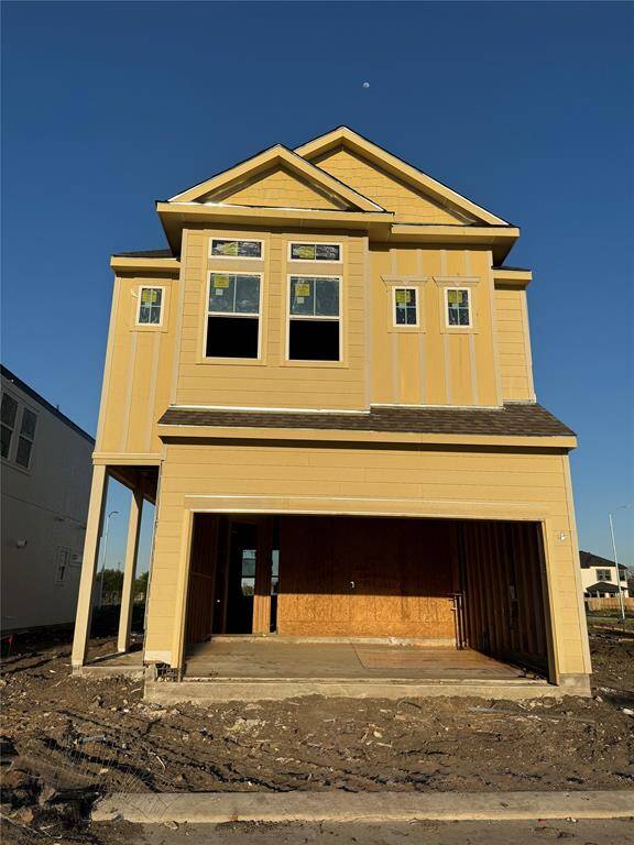 Three story home with 2 bedrooms, 2.5 baths, and 2 car garage.