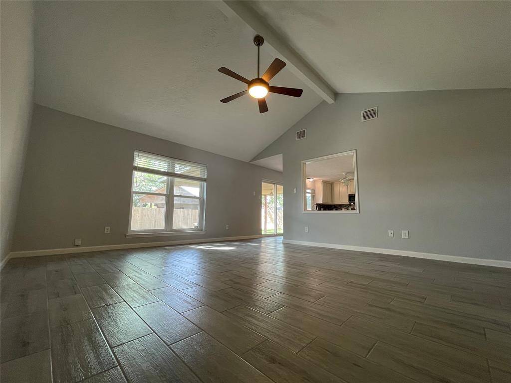 Family room leads to a spacious kitchen/dining area.