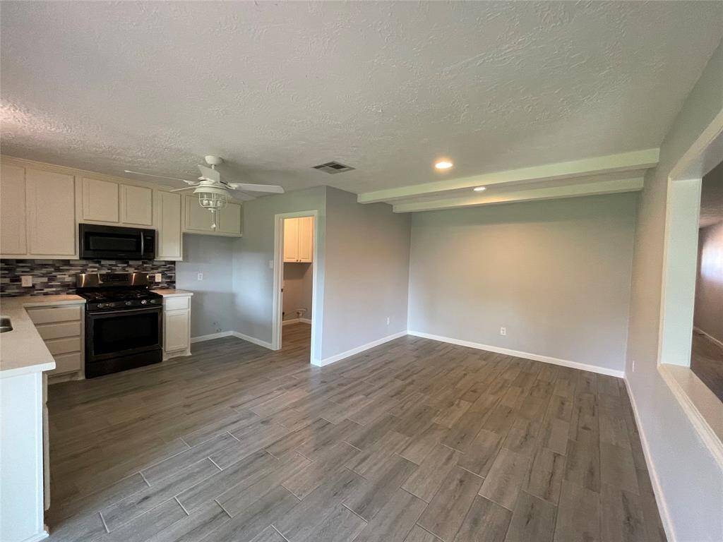 Spacious dining area is open to the kitchen.  Plenty of room for a moveable island/work station and dining set.