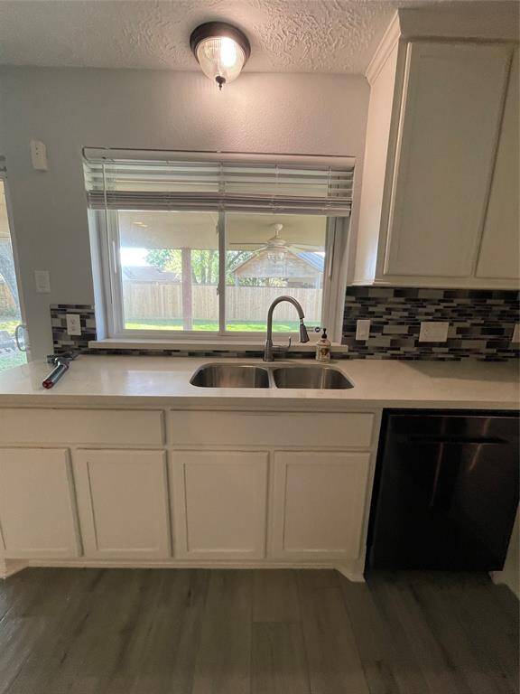 A closer view of the stainless steel sink and upgraded faucet.  Blinds on all windows are included.  Windows are double paned, energy efficient.