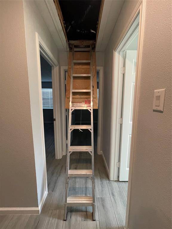 Convenient indoor attic access with an upgraded aluminum ladder.  Includes a light switch at the top of the ladder to control lights in the attic.