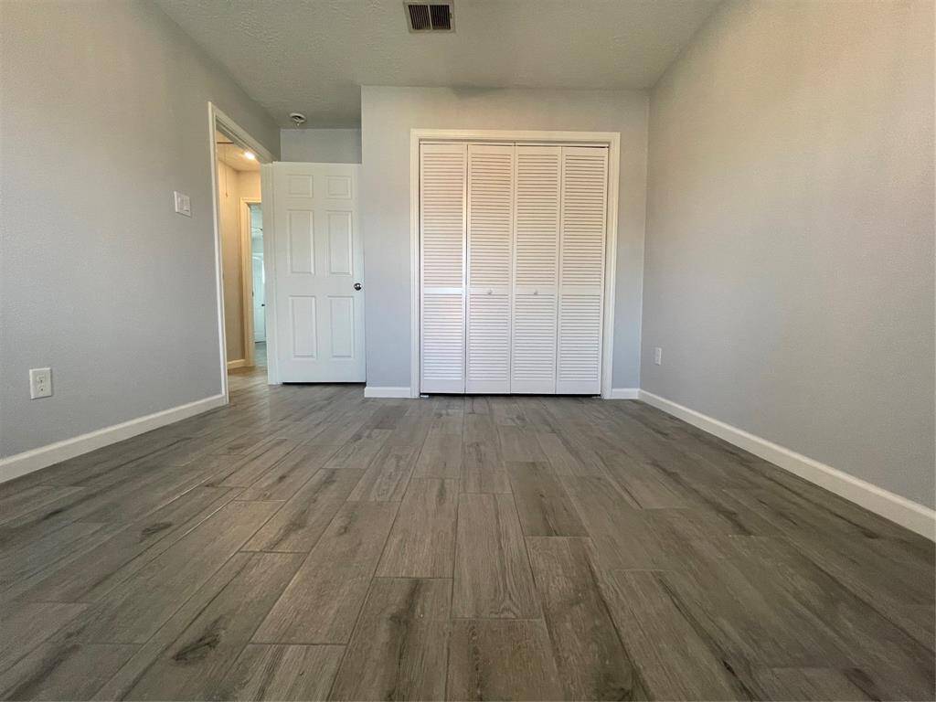 Secondary bedroom #2 offers a little more space with large closet and built-ins.
