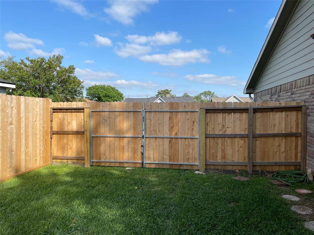 Double-wide gate for trailer, RV with easy access to the backyard.