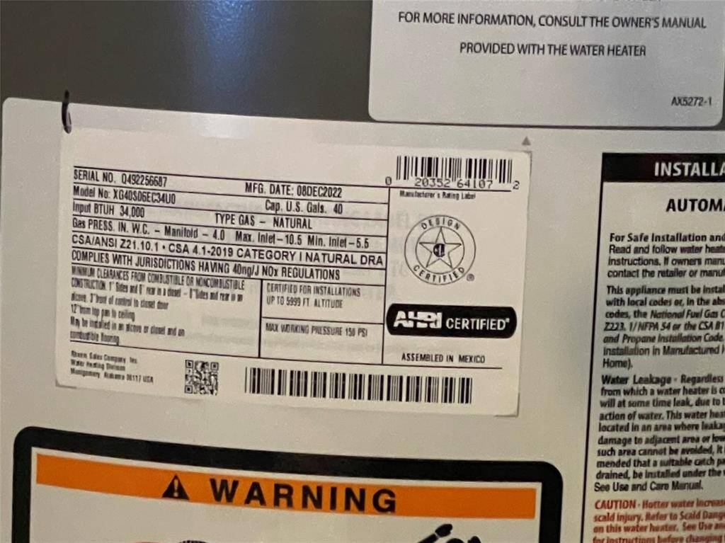 Water heater information label with Mfg. date stated as December 2022.