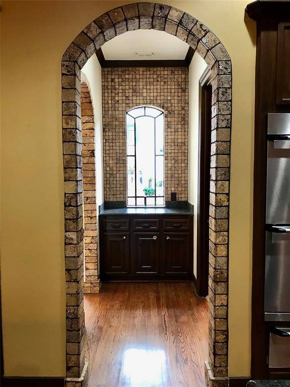 The view of the butler's pantry. Notice the window that is featured throughout the home