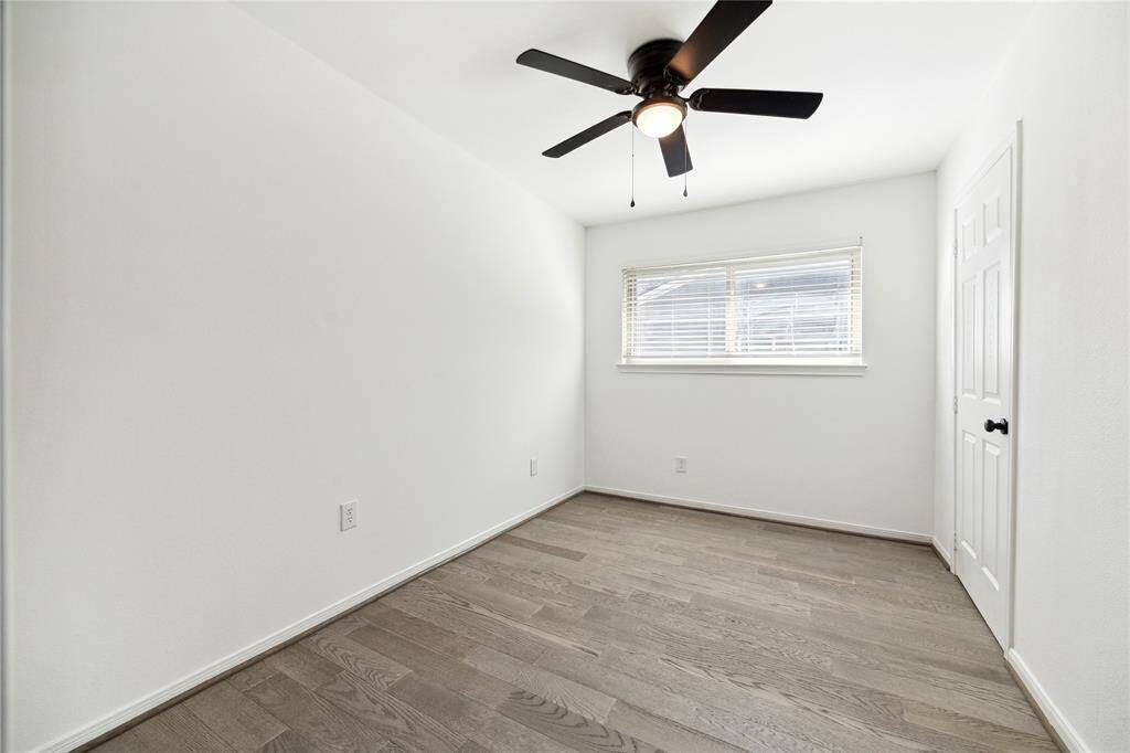 The smaller secondary bedroom is ideal for a home office or nursery.