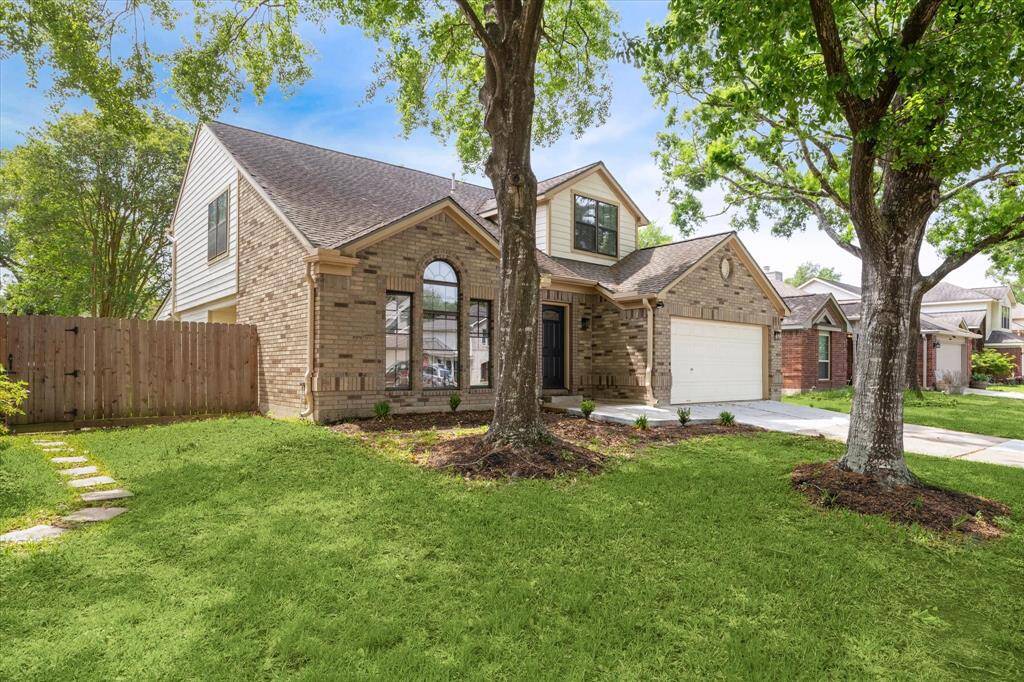 Enjoy large shade trees in the front yard.