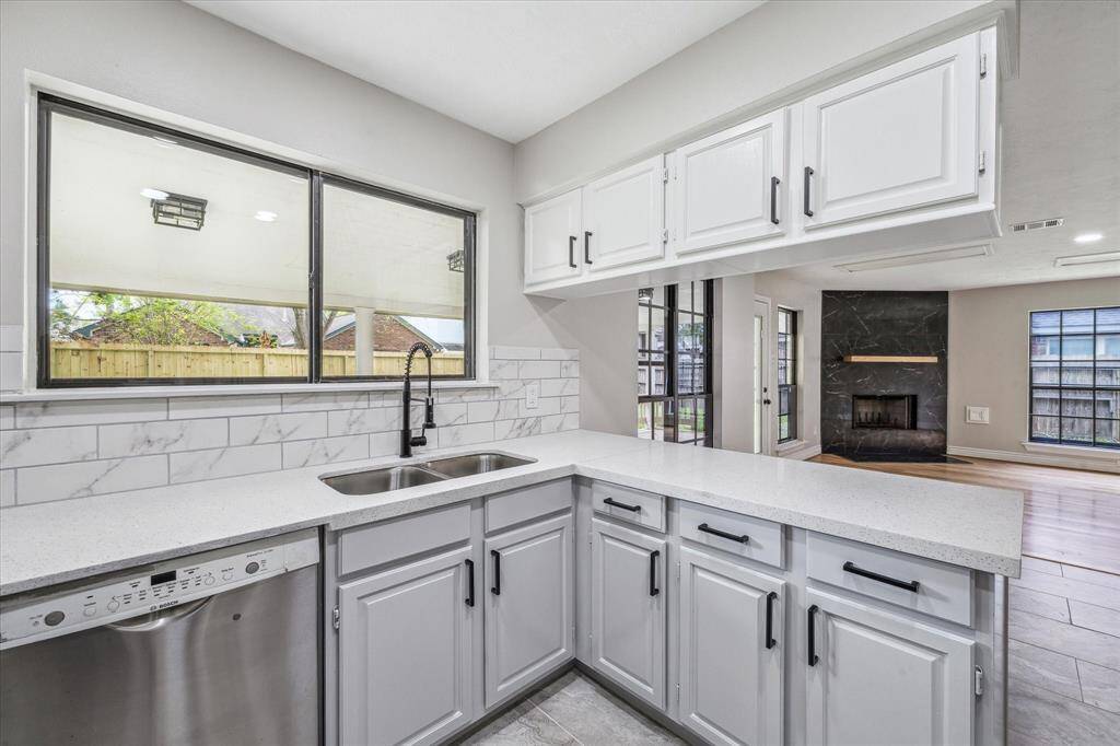 View looking toward the family room. There is room for extra seating at the breakfast bar.