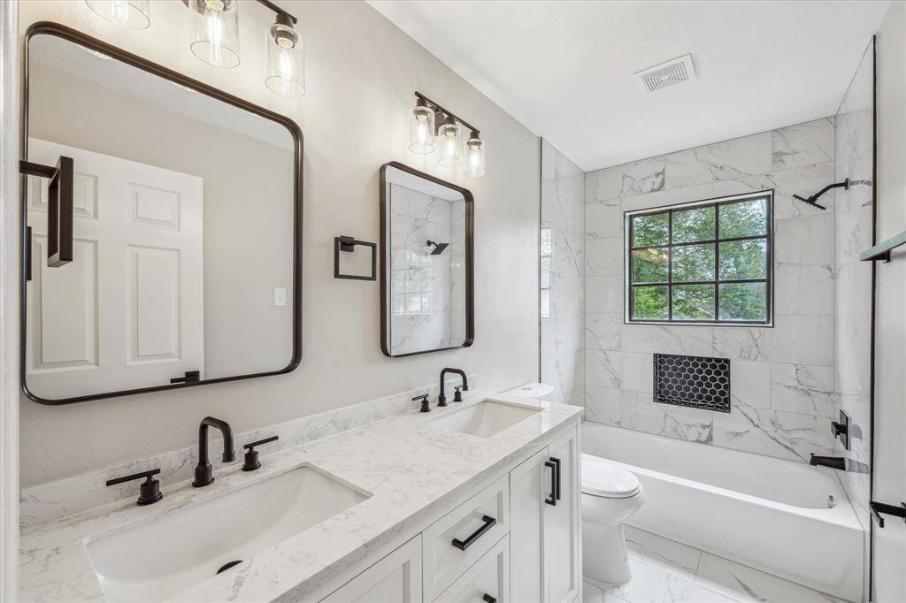 The upstairs secondary bathroom has been completely remodeled.