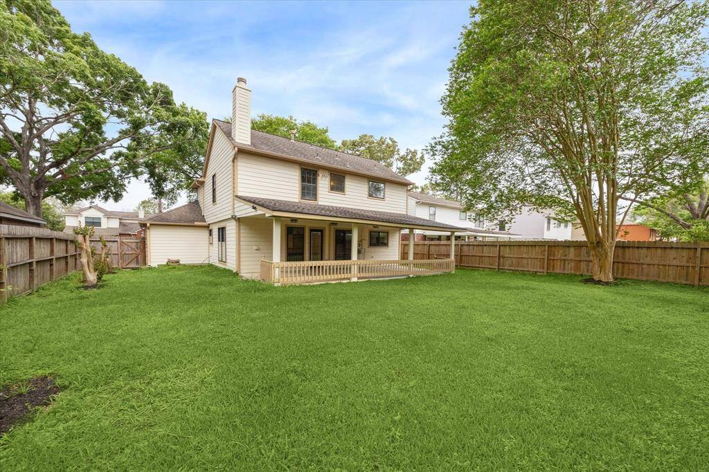 Enjoy your backyard space with a large covered patio.