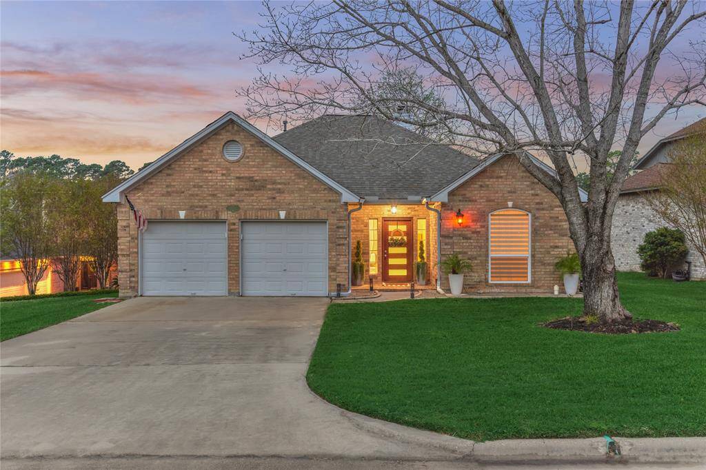12464 Lake Vista Drive is a completely remodeled dreamy waterfront home in the heart of Lake Conroe's premier manned gated subdivision of Point Aquarius.