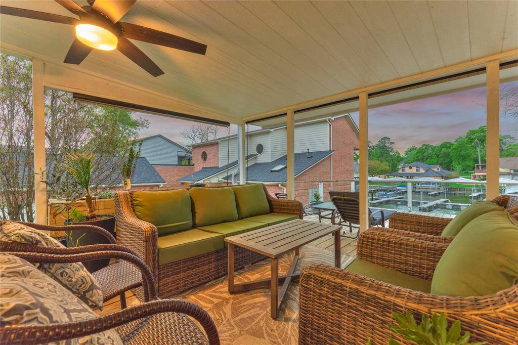 Enjoy peaceful water views and evening breezes is this welcoming covered space.