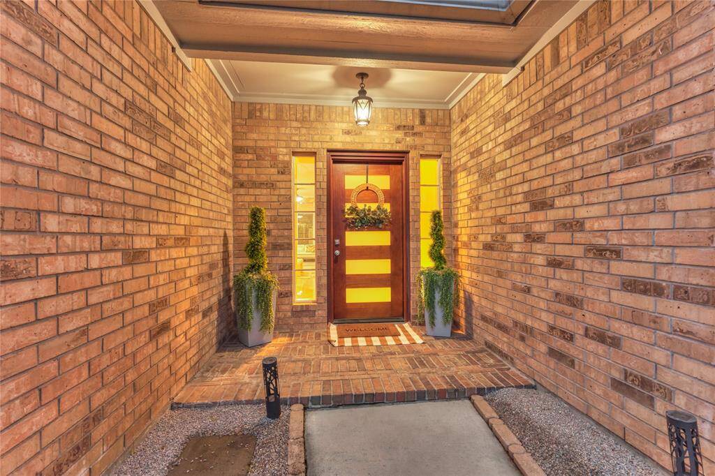 A covered entrance for your guests to wait out of the elements.