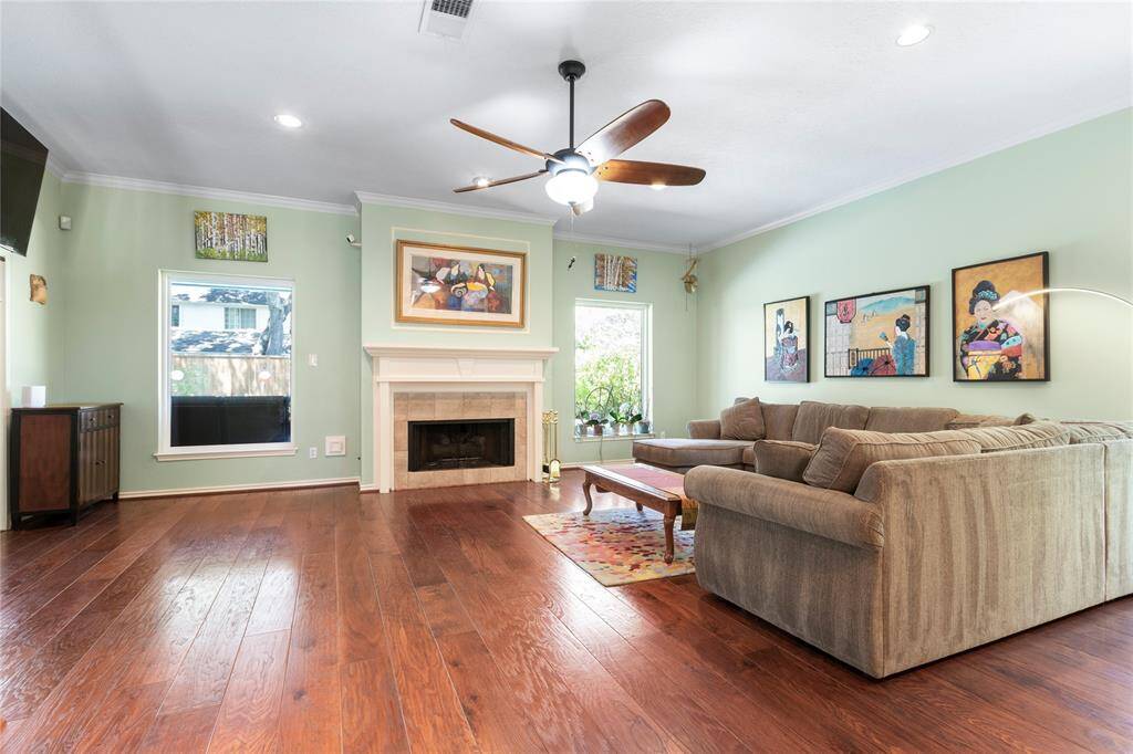 To the back of the house is the large family room with a fireplace for those chilly winter nights.