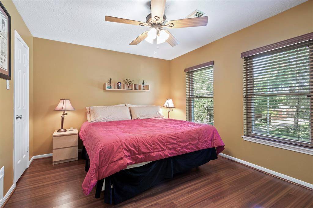 Here is a large bedroom to the right of the stairs with a full bath.