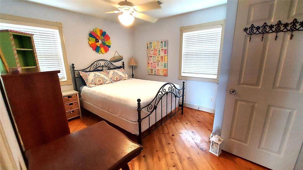 Primary Bedroom with Queen Bed Just Off the Main Living Area.