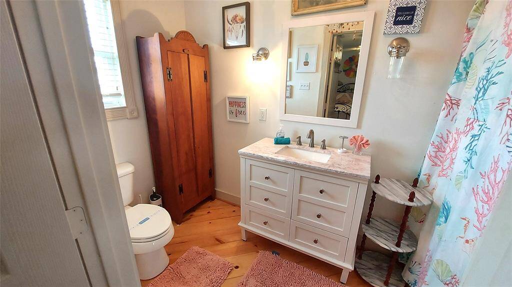 Primary Bathroom with Tub-Shower Combo.