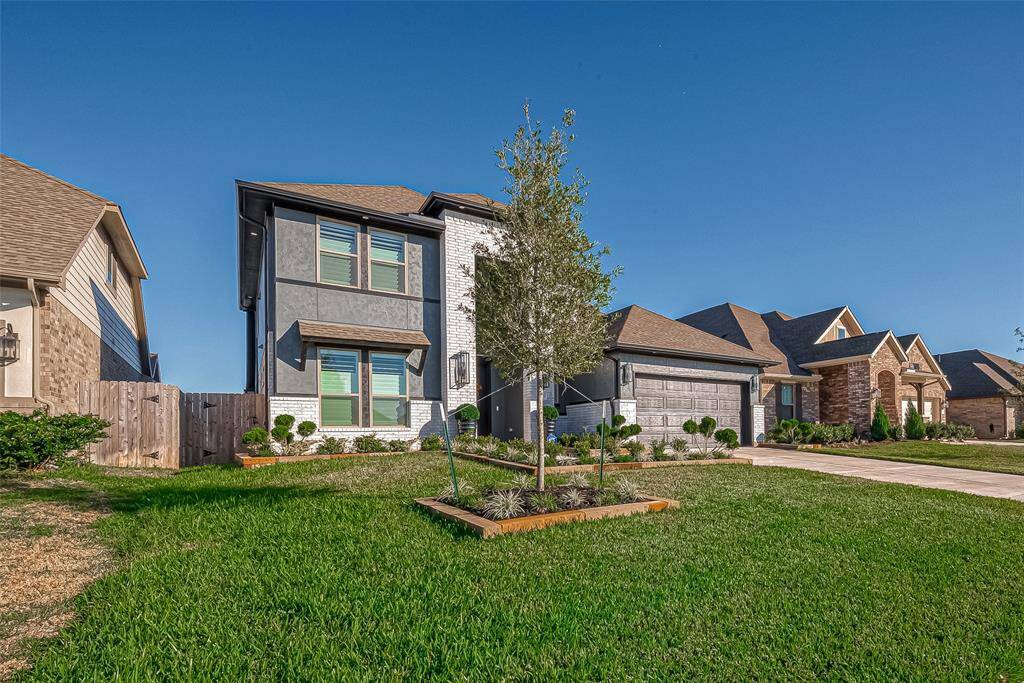 The neatly manicured lawn and inviting front porch add to the warmth and curb appeal of this beautiful residence, making it the ideal place to call home.