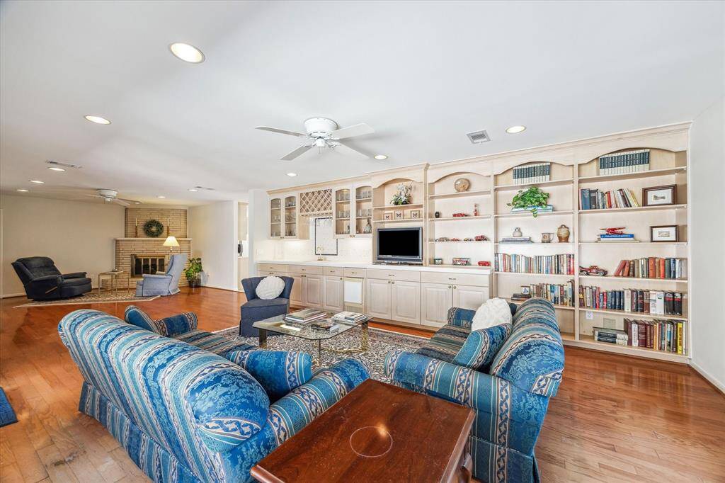 Built ins in the Family Room showcase books and treasures collected over the years.
