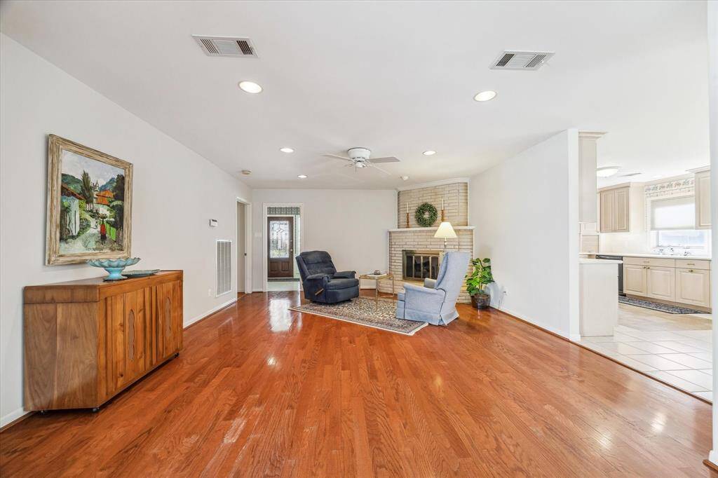 This space is immense and right off the Kitchen/Breakfast area!