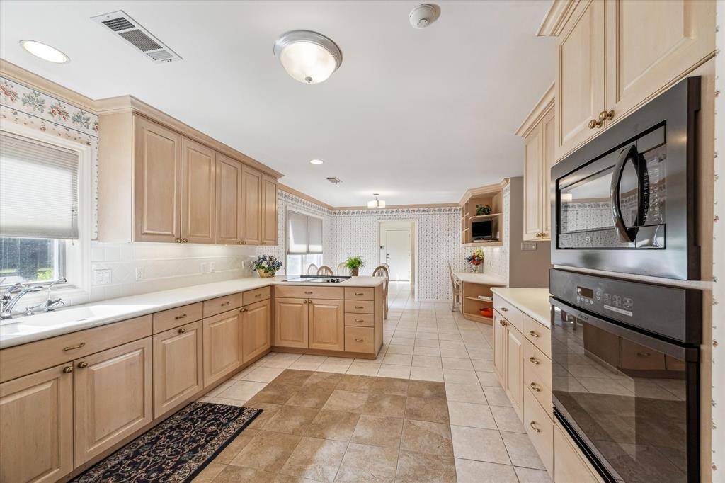 Lazy Susan's maximize space and electrical outlets are provided throughout the space to allow for ease during meal preparation.