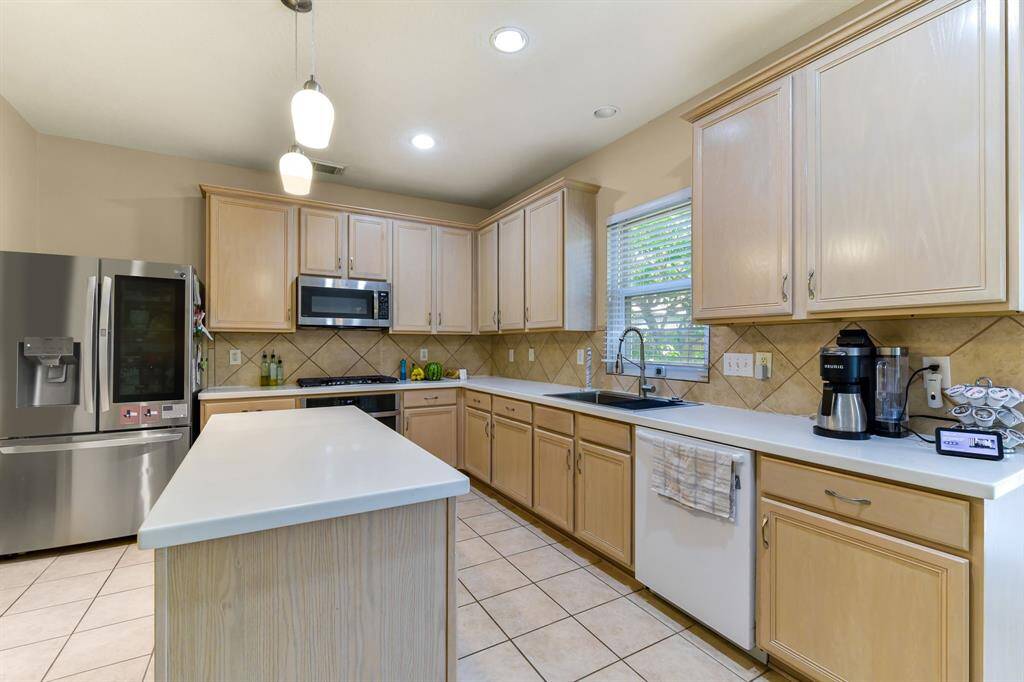 A warm and inviting kitchen perfect for baking cookies or enjoying a cup of coffee creating a cozy atmosphere for both cooking and heartfelt conversations.