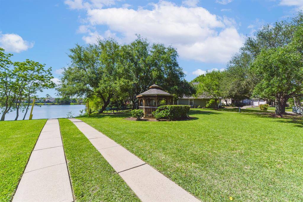 Enjoy the serene beauty of the neighborhood lake, offering peaceful views and a charming gazebo perfect for relaxing or taking in the surroundings. The tranquil waters and scenic setting provide a perfect spot for unwinding, while the gazebo invites you to sit back and soak in the natural beauty of the area. A truly idyllic retreat just steps from your door.