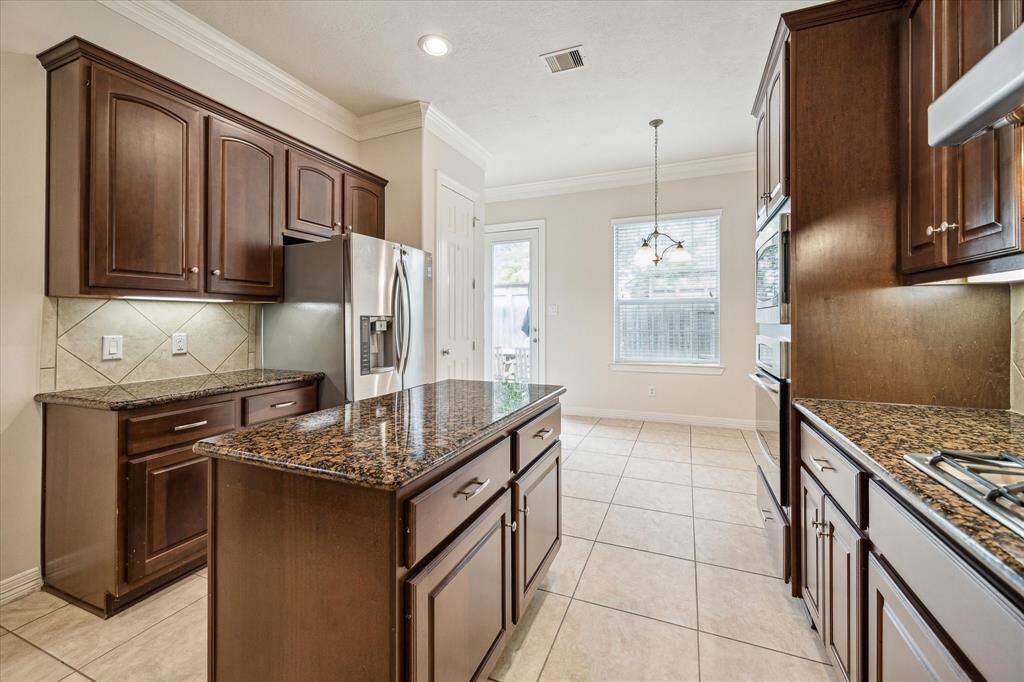 The Kitchen it is every chef's dream... with an abundance of natural light and plenty of cabinets and counter space to create culinary dishes for your family to enjoy. Offers a generous pantry closet for all your extra storage needs.